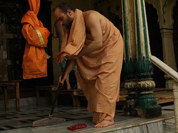 Cleaning Radha Damodar Devotees Altar