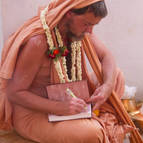 Giri Maharaja Signing Copies of the Gita