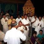 Devotees Chanting During the Arati